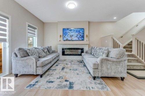1459 Cherniak Way, Edmonton, AB - Indoor Photo Showing Living Room With Fireplace
