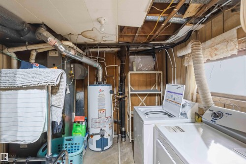 Image quality insufficient for description - 16 Michigan Street, Devon, AB - Indoor Photo Showing Laundry Room