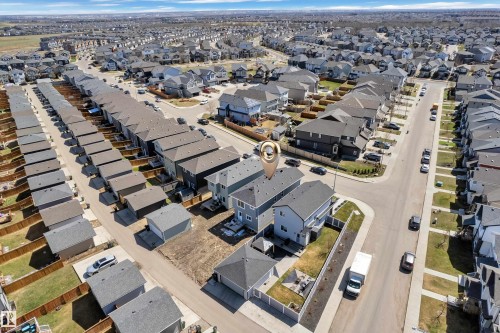 Aerial perspective showcasing a residential area with uniform housing - 6092 179 Ave Nw, Edmonton, AB - Outdoor With View
