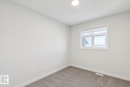 1081 Berg Place, Leduc, AB - Indoor Photo Showing Other Room