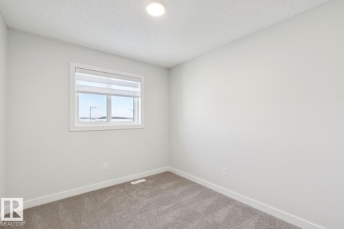 1081 Berg Place, Leduc, AB - Indoor Photo Showing Other Room