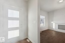 1081 Berg Place, Leduc, AB  - Indoor Photo Showing Other Room With Fireplace 
