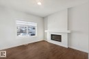 1081 Berg Place, Leduc, AB  - Indoor Photo Showing Living Room With Fireplace 