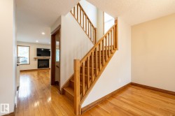 Hardwood flooring throughout the main level and staircase - 