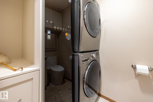 Stackable laundry appliances - 4632 151 Street, Edmonton, AB - Indoor Photo Showing Laundry Room