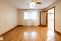 Hardwood flooring with matching baseboards and door trim - 