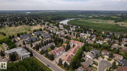 Aerial perspective showcasing a residential area with diverse property types - 4632 151 Street, Edmonton, AB - Outdoor With View