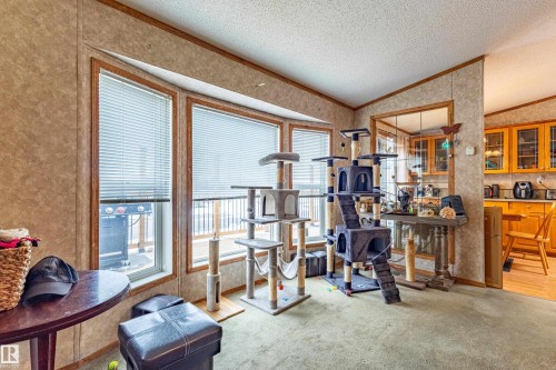 Bay window with horizontal blinds, offering exterior views - 1529 Range Road 272 Rural Parkland County, Alberta, Rural Parkland County, AB - Indoor