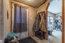 Entryway featuring a white door, tiled flooring, and wood-finish trim - 1529 Range Road 272 Rural Parkland County, Alberta, Rural Parkland County, AB  - Indoor Photo Showing Other Room 