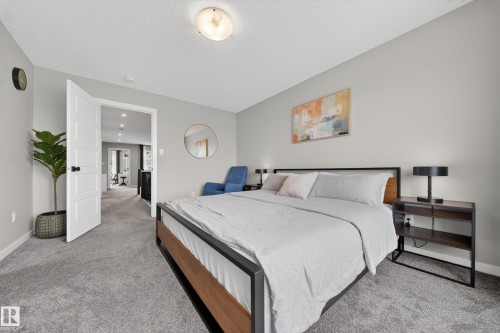 Bedroom featuring plush grey carpet and light grey wall paint - 3337 Kulay Way, Edmonton, AB - Indoor Photo Showing Bedroom