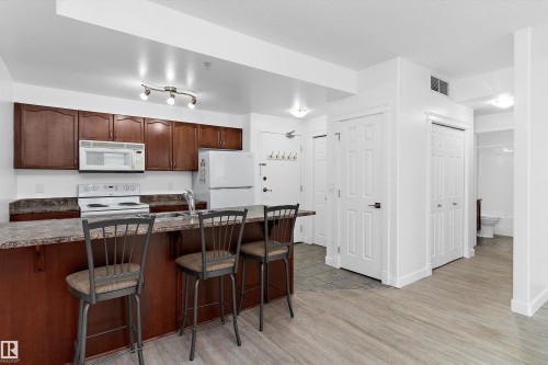 902 9939 109 Street, Edmonton, AB - Indoor Photo Showing Kitchen With Double Sink