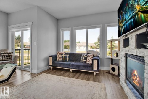 29 13215 153 Avenue, Edmonton, AB - Indoor Photo Showing Living Room With Fireplace