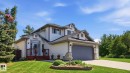 Two-story residence featuring white siding and a dark gray roof - 4309 37A Avenue, Edmonton, AB  - Outdoor With Facade 