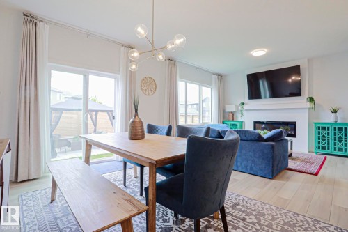28 Rosewood Way, St. Albert, AB - Indoor Photo Showing Dining Room With Fireplace
