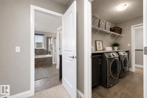 153 Sturtz Bend, Leduc, AB - Indoor Photo Showing Laundry Room