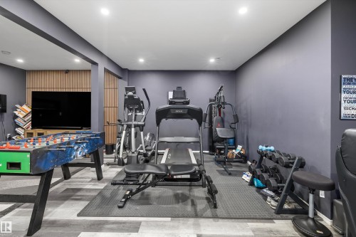 153 Sturtz Bend, Leduc, AB - Indoor Photo Showing Gym Room