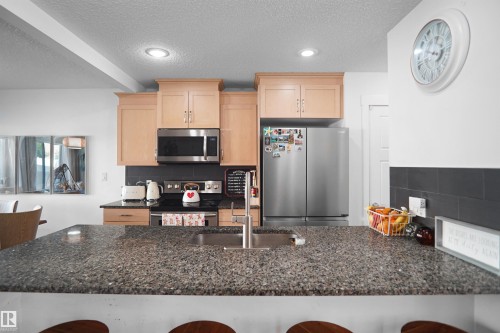 16804 53 Street, Edmonton, AB - Indoor Photo Showing Kitchen With Double Sink With Upgraded Kitchen