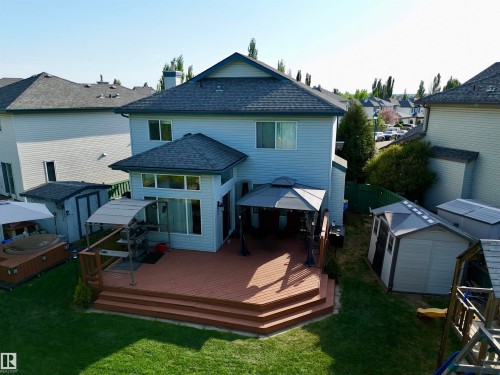 Expansive rear deck featuring multiple levels and a built-in hot tub - 442 Hunters Green, Edmonton, AB - Outdoor With Deck Patio Veranda With Exterior