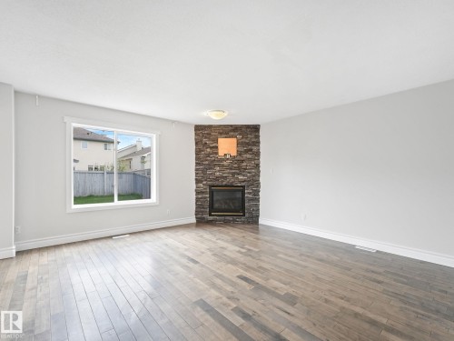 173 Castle Drive, Edmonton, AB - Indoor Photo Showing Living Room With Fireplace