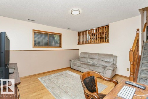 4923 11A Avenue, Edmonton, AB - Indoor Photo Showing Living Room With Fireplace