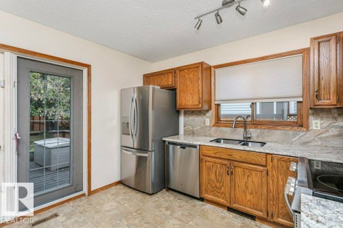 4923 11A Avenue, Edmonton, AB - Indoor Photo Showing Kitchen With Double Sink