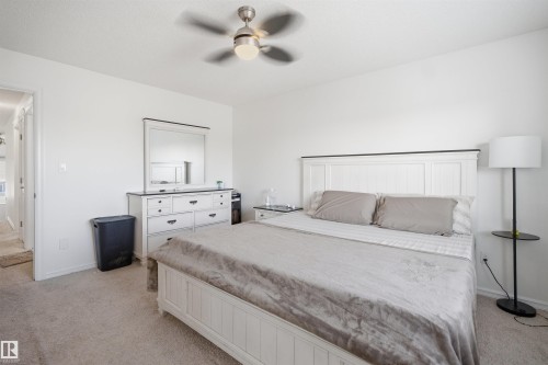Neutral-toned carpeting throughout - 1523 36 Avenue, Edmonton, AB - Indoor Photo Showing Bedroom