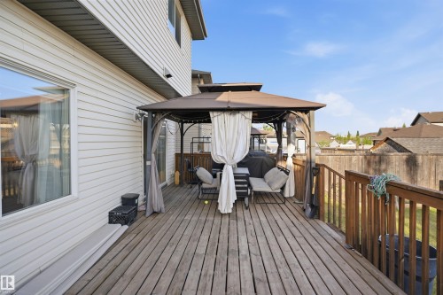 Expansive wood deck with a privacy gazebo and wood railing - 1523 36 Avenue, Edmonton, AB - Outdoor With Deck Patio Veranda With Exterior