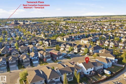 Aerial perspective showcasing a residential neighborhood with diverse housing styles - 1523 36 Avenue, Edmonton, AB - Outdoor With View