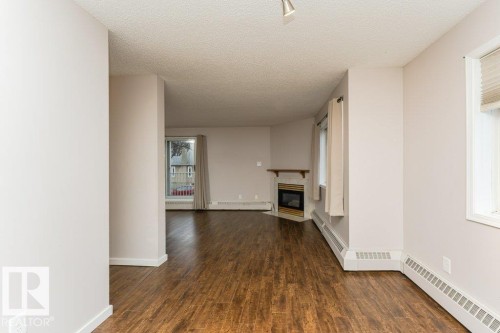 203 8503 108 Street, Edmonton, AB - Indoor With Fireplace