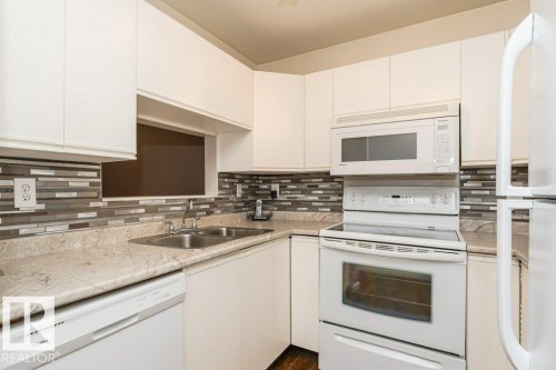203 8503 108 Street, Edmonton, AB - Indoor Photo Showing Kitchen With Double Sink