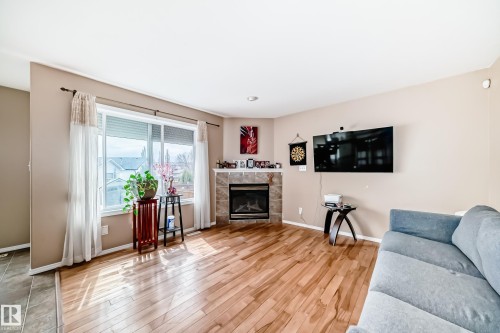 1815 36 Avenue, Edmonton, AB - Indoor Photo Showing Living Room With Fireplace