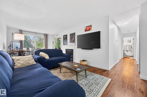 312 14811 51 Avenue, Edmonton, AB - Indoor Photo Showing Living Room