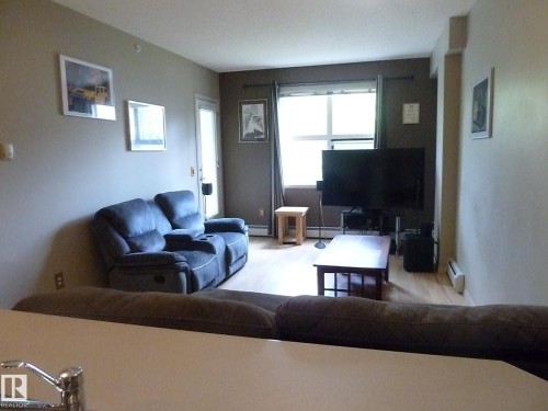 1-104 4245 139 Avenue, Edmonton, AB - Indoor Photo Showing Living Room