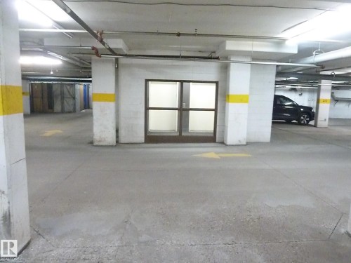 1-104 4245 139 Avenue, Edmonton, AB - Indoor Photo Showing Garage