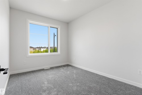 18 Meadowgrove Landing, Spruce Grove, AB - Indoor Photo Showing Other Room