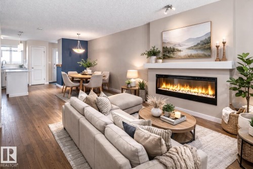 2241 Price Lane, Edmonton, AB - Indoor Photo Showing Living Room With Fireplace