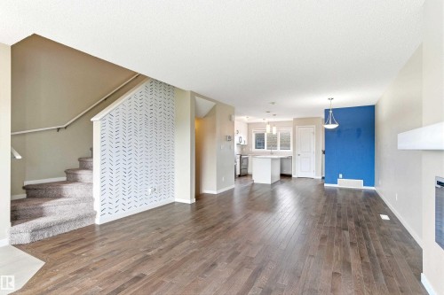 2241 Price Lane, Edmonton, AB - Indoor Photo Showing Living Room With Fireplace