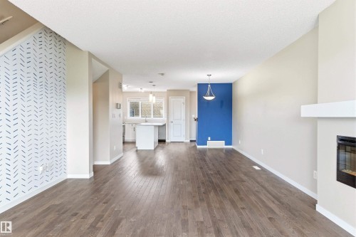 2241 Price Lane, Edmonton, AB - Indoor Photo Showing Other Room With Fireplace