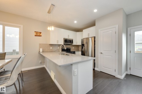 6687 Cardinal Road, Edmonton, AB - Indoor Photo Showing Kitchen With Double Sink
