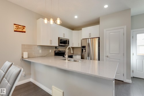 6687 Cardinal Road, Edmonton, AB - Indoor Photo Showing Kitchen With Double Sink