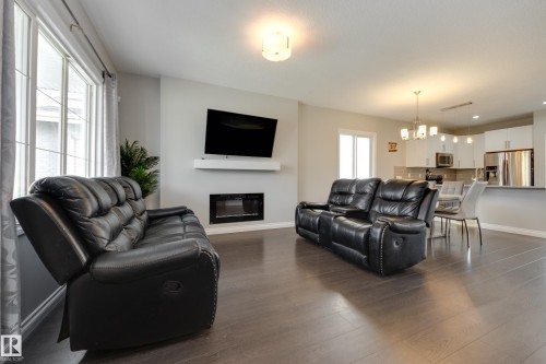 6687 Cardinal Road, Edmonton, AB - Indoor Photo Showing Living Room With Fireplace