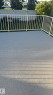 Expansive outdoor deck featuring a textured grey surface and white metal railings - 313 Jillings Crescent Nw, Edmonton, AB  - Outdoor 