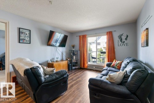 314 13710 150 Avenue, Edmonton, AB - Indoor Photo Showing Living Room