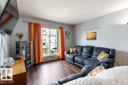 314 13710 150 Avenue, Edmonton, AB - Indoor Photo Showing Living Room