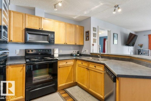 314 13710 150 Avenue, Edmonton, AB - Indoor Photo Showing Kitchen With Double Sink