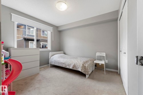 8 1030 Chappelle Boulevard, Edmonton, AB - Indoor Photo Showing Bedroom