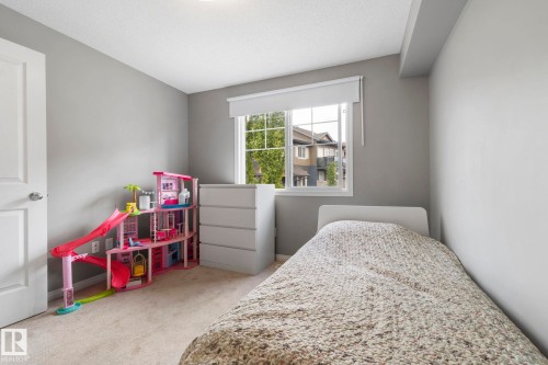 8 1030 Chappelle Boulevard, Edmonton, AB - Indoor Photo Showing Bedroom