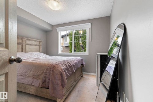 8 1030 Chappelle Boulevard, Edmonton, AB - Indoor Photo Showing Bedroom