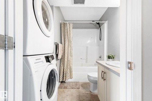 8 1030 Chappelle Boulevard, Edmonton, AB - Indoor Photo Showing Laundry Room