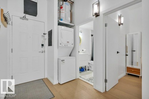 911 10024 Jasper Avenue, Edmonton, AB - Indoor Photo Showing Laundry Room